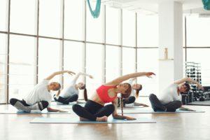 women practicing yoga