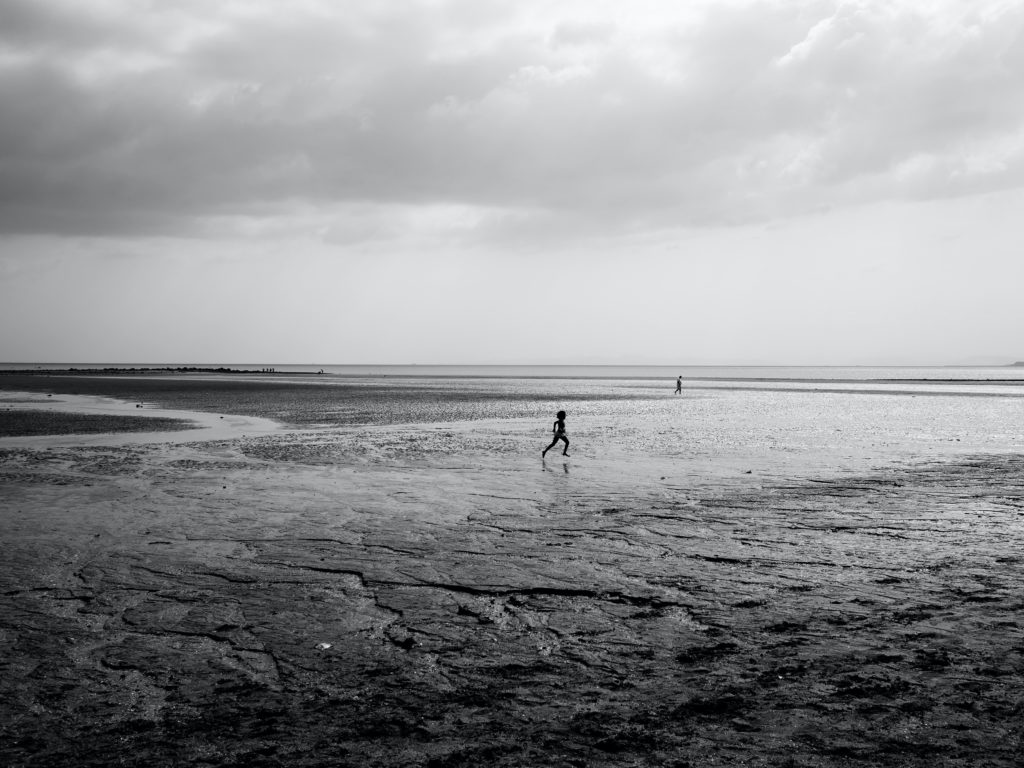 spiritual calmness, kid running by the shore