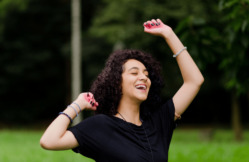 A woman embracing her feelings and emotions